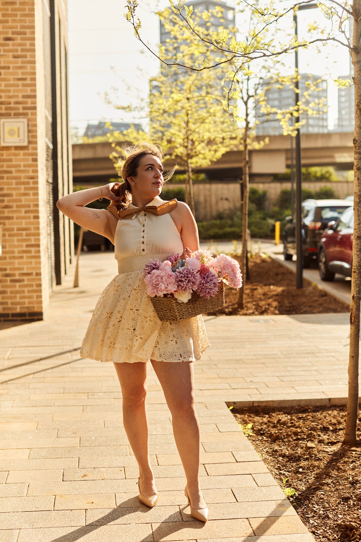 Vintage-Inspired White Dress with Bow Detail